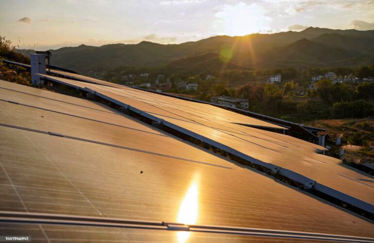 Ground-mounted solar panel system in Livermore, California with a scenic sunset view
