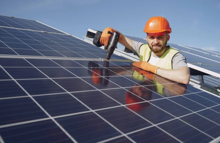 Technician installing solar panels on a rooftop in Los Gatos, California — CalPacific Power solar installation service.