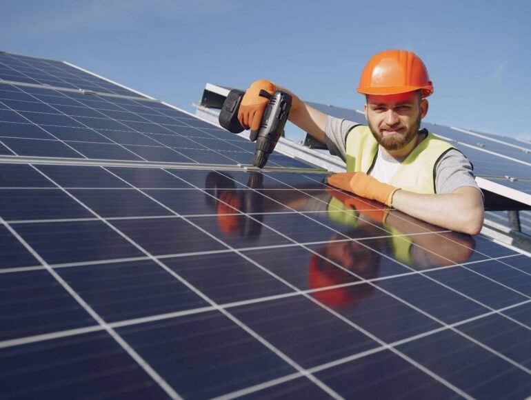 Technician installing solar panels on a rooftop in Los Gatos, California — CalPacific Power solar installation service.